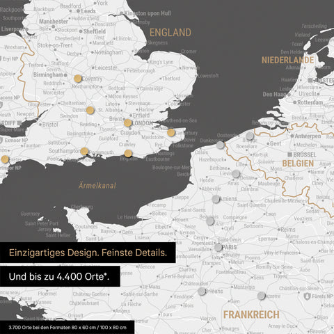 Ausschnitt einer magnetischen Europakarte in Dunkelgrau zeigt einen Ausschnitt von England, Frankreich und Belgien mit Details wie Nationalparks, Flüssen und zahlreichen kleineren Orten und Städten