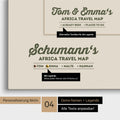 Pinnwand Leinwand einer Afrika-Karte in Dunkelgrün mit Personalisierung als Logo mit Familiennamen und Legende
