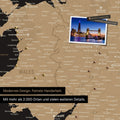 Ausschnitt einer Landkarte von Wales und England in Farbe Sonar Black (Schwarz-Gold) mit Pins zur Markierung von besuchten Reisezielen